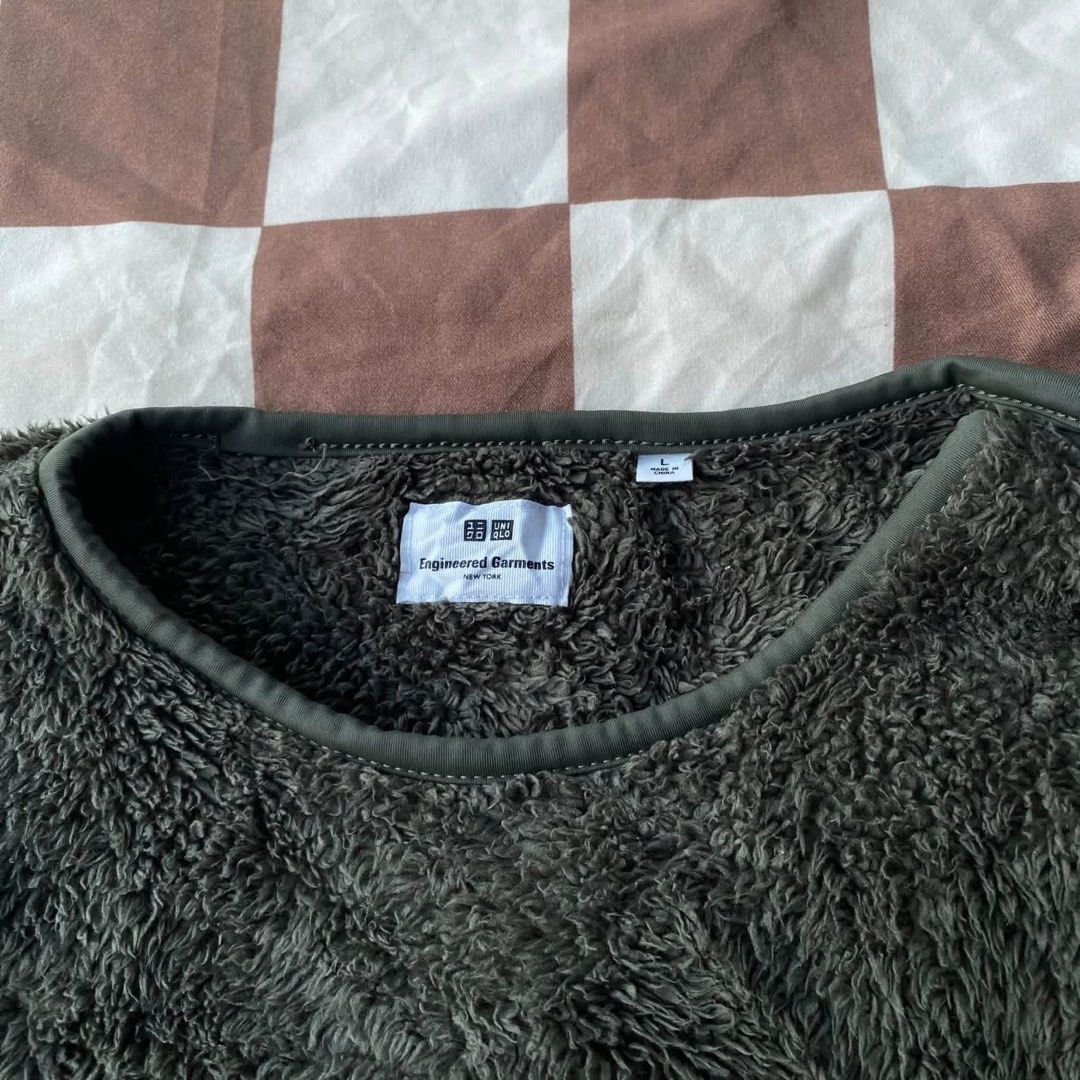 Uniqlo engineered garments fleece jacket (Category: Coats, Jackets and Outerwear) located in Mariveles. Submitted by mariathriftandpreloved (Listing ID 1463868170, Image 3). Description: Uniqlo engineered garments fleece jacket Large on tag width 24 length 27 dark green excellent condition no issue Loc: Bataan Courier: J&t.