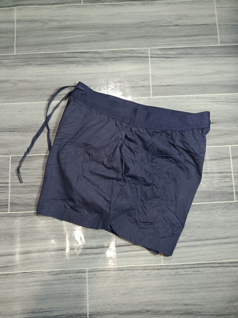Uniqlo Navy Blue Athletic Shorts with Drawstring (Category: Shorts) located in Bacolod City. Submitted by empatees (Listing ID 1463747191, Image 3). Description: - Navy blue athletic shorts - Elastic waistband with adjustable drawstring - Comfortable for workouts and lounging - Versatile for sports or casual outfits.