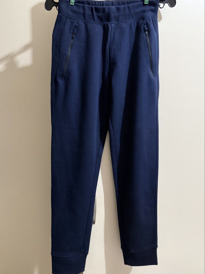 Uniqlo navy blue jogger pants (Category: Other Bottoms) located in Makati City. Submitted by prebykris (Listing ID 1463895286, Image 1). Description: .