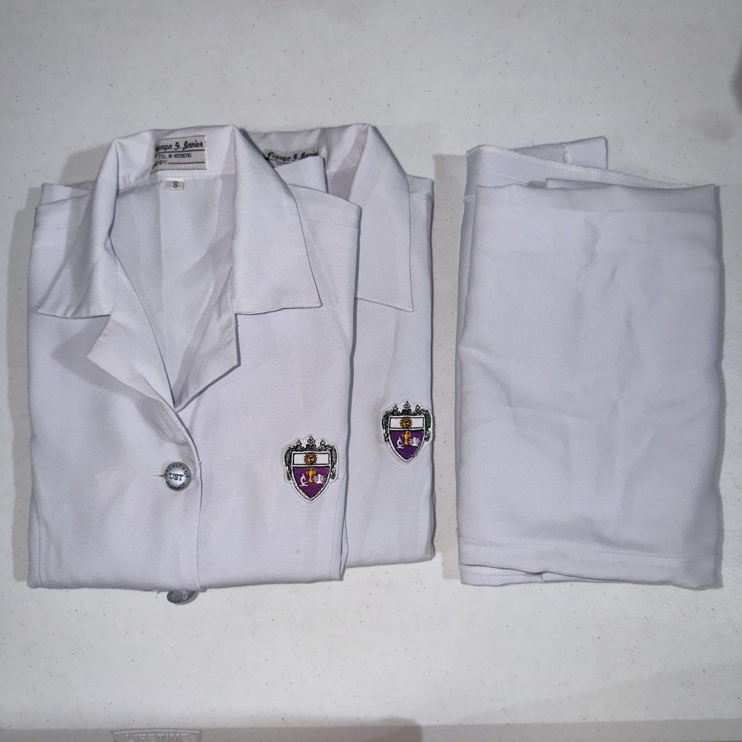 UST FOP Type A Uniform 2 Sets (Old Logo) (Category: Sets or Coordinates) located in Manila. Submitted by ashyannneb (Listing ID 1463841652, Image 1). Description: 400 for both sets Top - S Skirt - S.