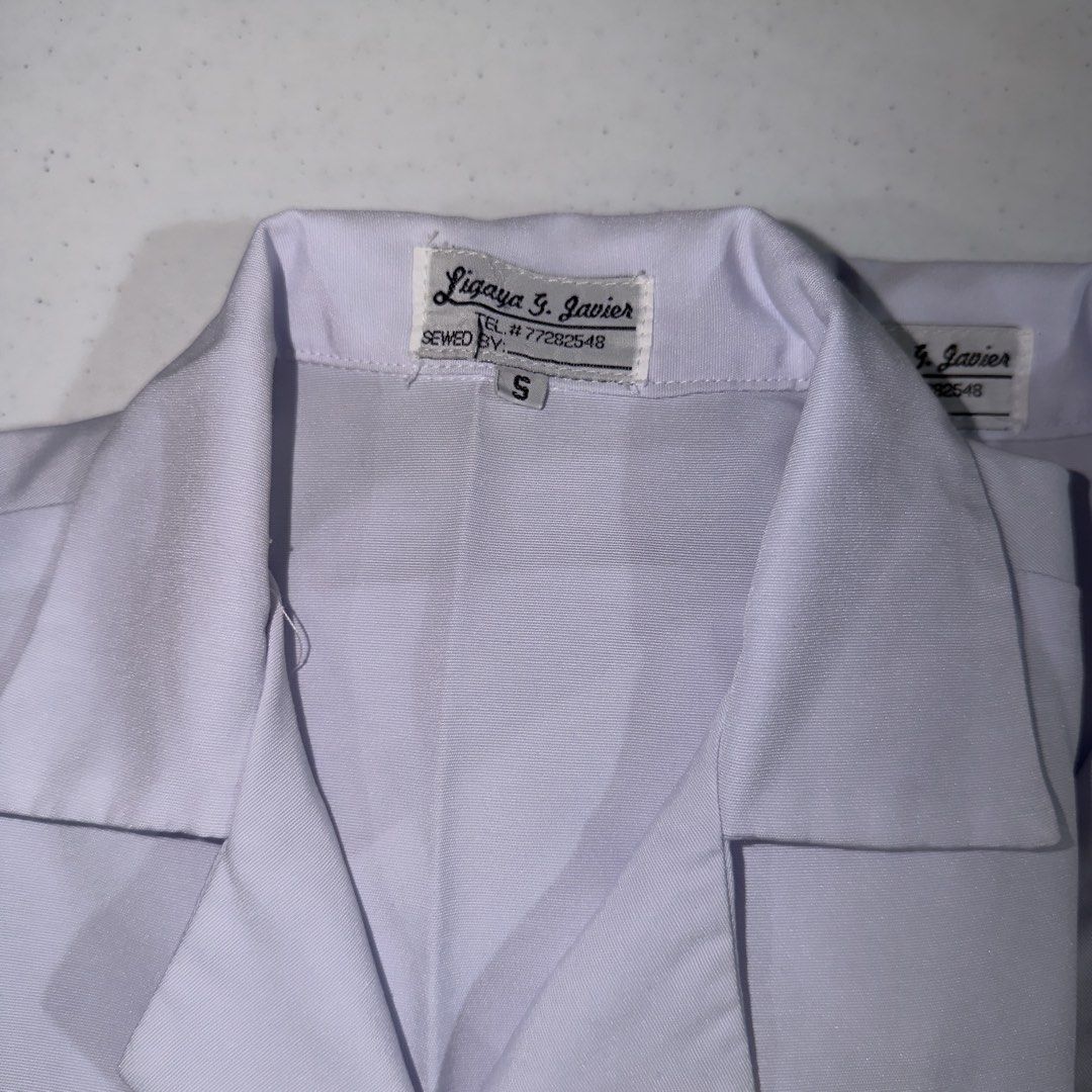 UST FOP Type A Uniform 2 Sets (New Logo) (Category: Sets or Coordinates) located in Manila. Submitted by ashyannneb (Listing ID 1463842538, Image 3). Description: 400 for both sets ‼️ Top - S Skirt - S Issues: - Water mark/stain from storage - Stain.