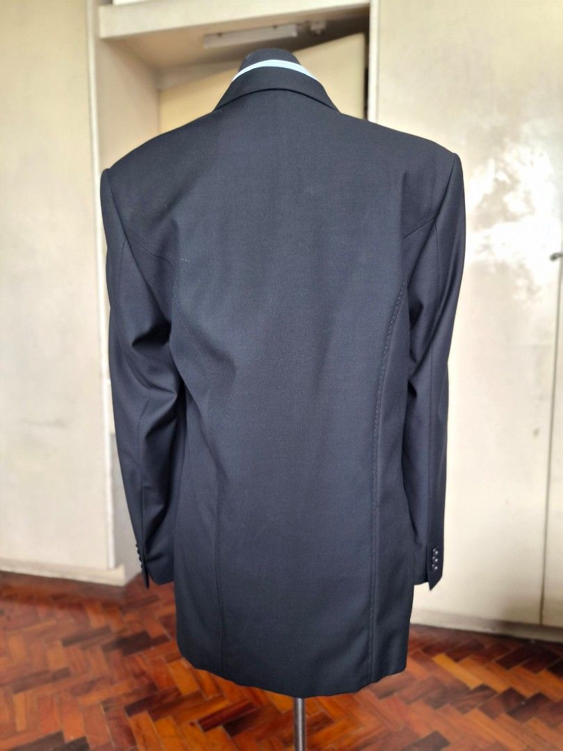 Van Heusen Black Suit Jacket (Category: Coats, Jackets and Outerwear) located in Manila. Submitted by gane_esla (Listing ID 1463802033, Image 2). Description: - Van Heusen black suit jacket - Double-breasted style with three buttons - Classic fit - Ideal for formal occasions or business wear - Size M: Shoulder-18"/45cm; arm legth-24"/61cm; coat length-29"/74cm; chest circumference-40"/102cm - Almost NEW. Used only 2X. - Shirt shown is for display