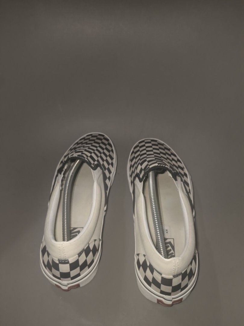 Vans Checkerboard Slip-On Shoes (Category: Sneakers) located in Manila. Submitted by ashlyjhon (Listing ID 1463866345, Image 3). Description: - Classic Vans checkerboard slip-on shoes - Iconic white and black pattern - Easy slip-on design for convenience - Soles show some wear but retain good grip - A versatile staple for any casual outfit.