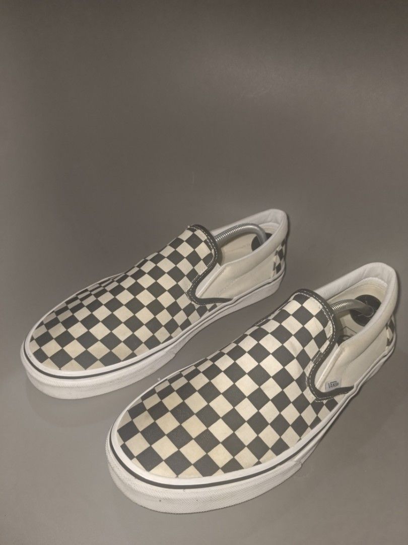 Vans Checkerboard Slip-On Shoes (Category: Sneakers) located in Manila. Submitted by ashlyjhon (Listing ID 1463866345, Image 1). Description: - Classic Vans checkerboard slip-on shoes - Iconic white and black pattern - Easy slip-on design for convenience - Soles show some wear but retain good grip - A versatile staple for any casual outfit.