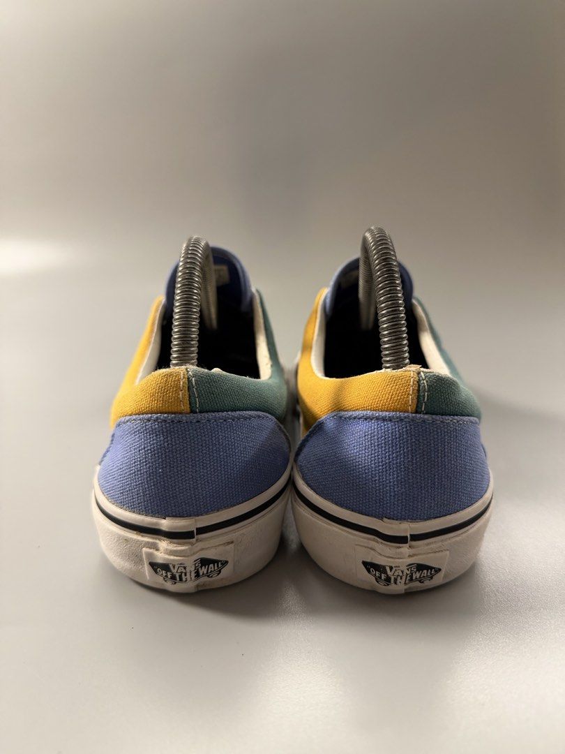 Vans Era Colorblock Sneakers (Category: Sneakers) located in Caloocan City. Submitted by maempenafi21452 (Listing ID 1463751349, Image 3). Description: - Vans Era sneakers in a vibrant colorblock design. - Features eye-catching panels of black, teal, yellow, and blue. - Crisp white laces and matching white soles for a clean look. - Iconic Vans branding proudly displayed on the heel. - Ideal for adding a pop of color to your casual outfits..