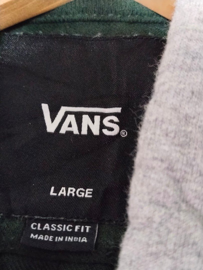 Vans Hooded Jacket (Category: Coats, Jackets and Outerwear) located in Mabalacat. Submitted by al_amin_thrift (Listing ID 1463814492, Image 2). Description: 🌲 Vans Hooded Flannel Overshirt Jacket — Size L ✅ Brand: Authentic Vans — "Off The Wall" ✅ Color: Dark Olive Green body + Light Heather Grey hood ✅ Size: L — Classic Fit ✅ Features: - Soft brushed flannel fabric — warm & comfortable ​ - Attached fleece-lined hood with drawstring ​ - Snap-but
