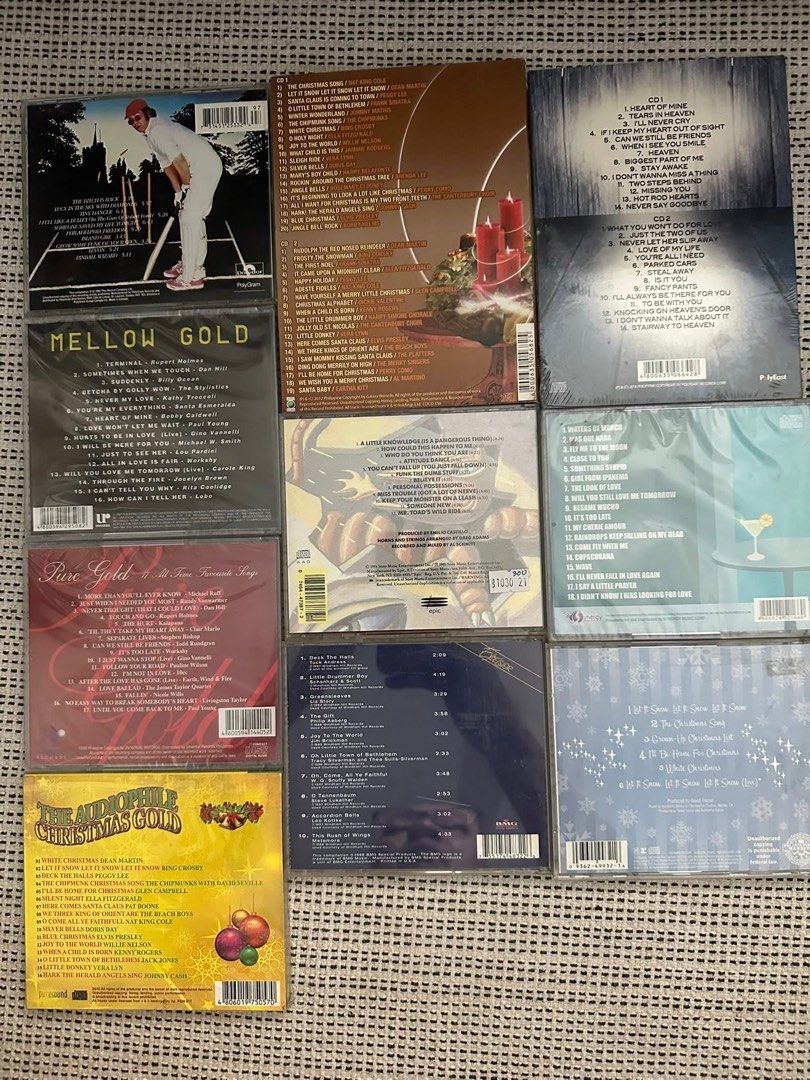 Various Artists Christmas & Mellow Gold CDs (Category: CDs & DVDs) located in Manila. Submitted by cosmicriver.212058 (Listing ID 1463896145, Image 1). Description: - Collection of Christmas CDs featuring artists like The Carpenters, Mannheim Steamroller, and Michael Bublé. - Includes 'Mellow Gold' and 'Pure Gold' compilation albums. - Perfect for music enthusiasts and holiday cheer. - Some CDs feature original artist recordings. - Please check t