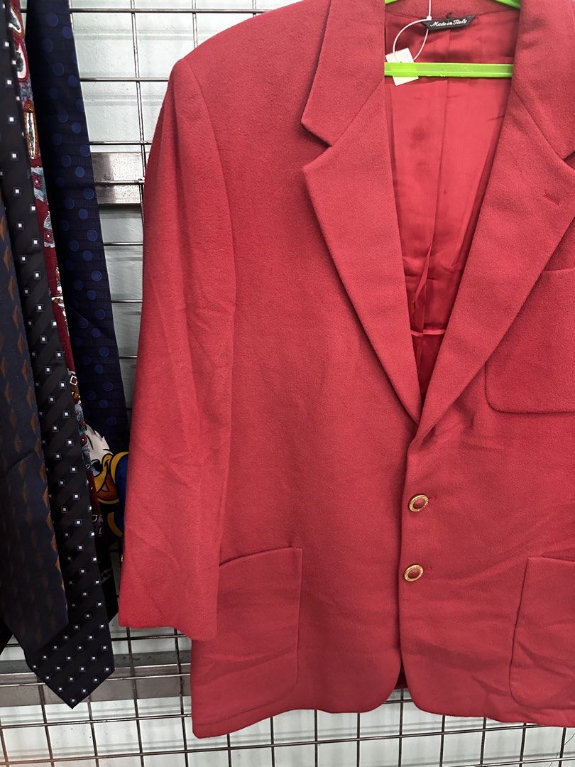 Versace Jeans Couture Red Wool Blend Blazer (Category: Luxury Apparel) located in Urdaneta. Submitted by redeemedcollective (Listing ID 1463926179, Image 2). Description: Red Versace Jeans Couture blazer with a notched lapel, three patch pockets, branded gold-tone buttons and a contrasting dark underside on the collar. The labels show “Made in Italy” and a wool-blend fabric. Condition: Pre-owned. A lower front button appears to be missing, and th