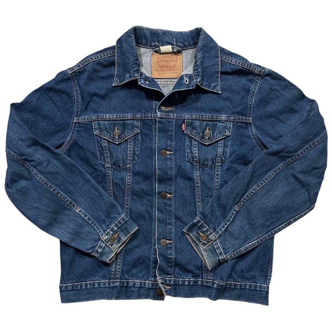 Vintage 80’s Levis Type III Trucker Denim Jacket (Category: Coats, Jackets and Outerwear) located in Tubao. Submitted by elyu_grails (Listing ID 1463848456, Image 1). Description: Vintage 80’s Levi’s Type III Trucker Denim Jacket This is a classic Levi’s indigo dark-wash denim trucker jacket featuring signature dual chest flap pockets and the iconic red tab with adjustable back waist. Size XL on tag Dimes 24x27 Excellent condition No major issue 