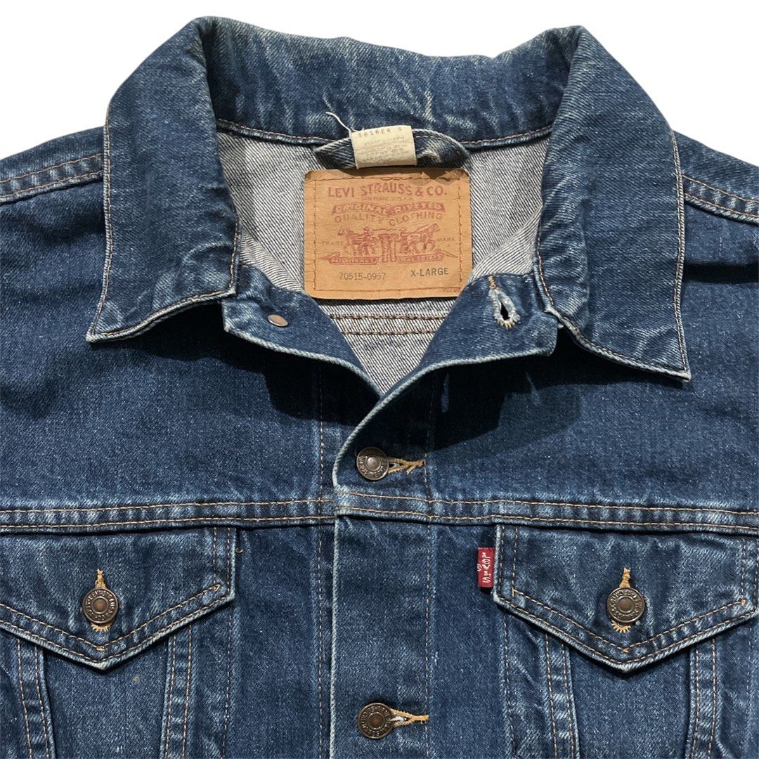 Vintage 80’s Levis Type III Trucker Denim Jacket (Category: Coats, Jackets and Outerwear) located in Tubao. Submitted by elyu_grails (Listing ID 1463848456, Image 3). Description: Vintage 80’s Levi’s Type III Trucker Denim Jacket This is a classic Levi’s indigo dark-wash denim trucker jacket featuring signature dual chest flap pockets and the iconic red tab with adjustable back waist. Size XL on tag Dimes 24x27 Excellent condition No major issue 