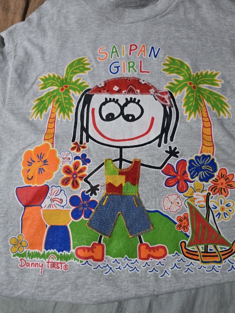 Vintage 90s Danny First Art Tee (Category: Activewear) located in Imus. Submitted by christianns2106 (Listing ID 1463903011, Image 3). Description: Authentic Vintage 90s Danny First Saipan Girl Excellent Condition 9/10 Color Rate 9.5/10 Size M Dimension: Width 21 (inch), Length 29 (inch) Negotiable.