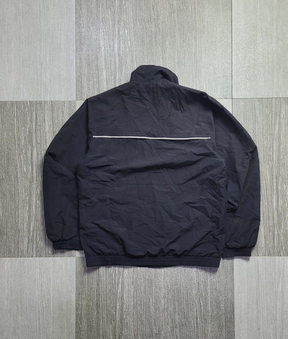 VINTAGE ADIDAS WINDBREAKER (Category: Hoodies) located in Manila. Submitted by 7100treasure.co (Listing ID 1463882777, Image 2). Description: VINTAGE ADIDAS WINDBREAKER • Style: Vintage Windbreaker • Color: Black • Breathable black mesh interior lining • Classic embroidered Adidas Performance logo • White piping design across the chest and back • Full-zip closure • Elastic cuffs and bottom hem • Width: 28" • Length: 22" ​📍 Dipolog City, Zamboang