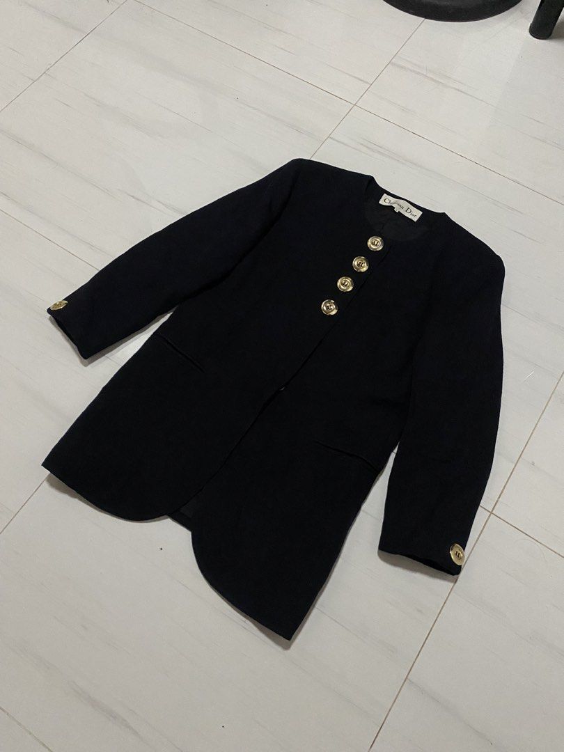 Vintage Christian Dior Collarless blazer (Category: Coats, Jackets and Outerwear) located in Manila. Submitted by morsgotthrift (Listing ID 1463833057, Image 2). Description: Vintage Christian Dior Black Collarless Textured Fabric With Gold Tone Bottons blazer Color may vary due to lighting 100% Authentic Excellent Condition Size L on tag Width - 20 Length - 30 Sleeve - 21 Shoulder - 18 No issue No flaws excellent color rate 1,980+sf.