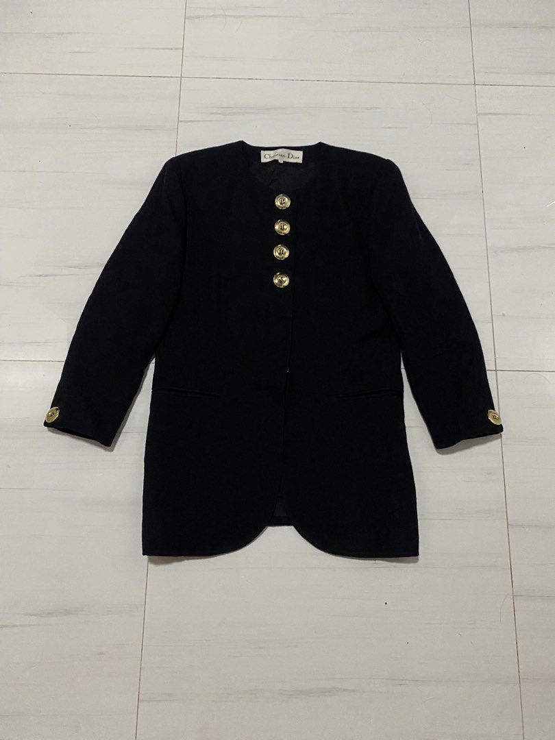 Vintage Christian Dior Collarless blazer (Category: Coats, Jackets and Outerwear) located in Manila. Submitted by morsgotthrift (Listing ID 1463833057, Image 1). Description: Vintage Christian Dior Black Collarless Textured Fabric With Gold Tone Bottons blazer Color may vary due to lighting 100% Authentic Excellent Condition Size L on tag Width - 20 Length - 30 Sleeve - 21 Shoulder - 18 No issue No flaws excellent color rate 1,980+sf.