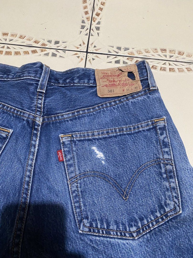 Vintage Levis 501 distressed jeans (Category: Jeans) located in Cebu City. Submitted by hustler_69 (Listing ID 1463846991, Image 3). Description: Vintage levis 501 distressed jeans Size 31 on tag but fits 32 waistline 38.5 inches length Very good condition Details are all posted.