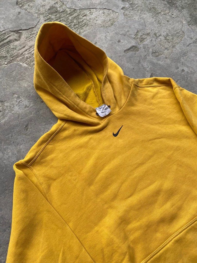 VINTAGE NIKE MID SWOOSH (Category: Coats, Jackets and Outerwear) located in Manila. Submitted by zayneeee. (Listing ID 1463831765, Image 1). Description: Vintage Nike Center Swoosh Check Hoodie Medium Mustard Yellow Black Swoosh (RARE) no issue solid nito par 26*29 .
