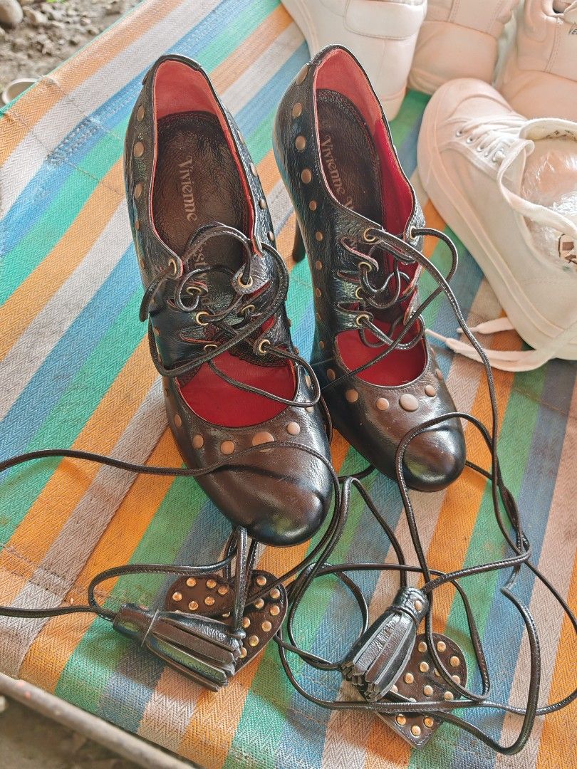 Vivienne Westwood (Category: Sneakers & Footwear) located in Santa Cruz. Submitted by ukayhuntworldwide (Listing ID 1463812499, Image 1). Description: Vivienne Westwood Black Patent Leather Studded Lace-up Pump Excellent condition Size 36 1/2.