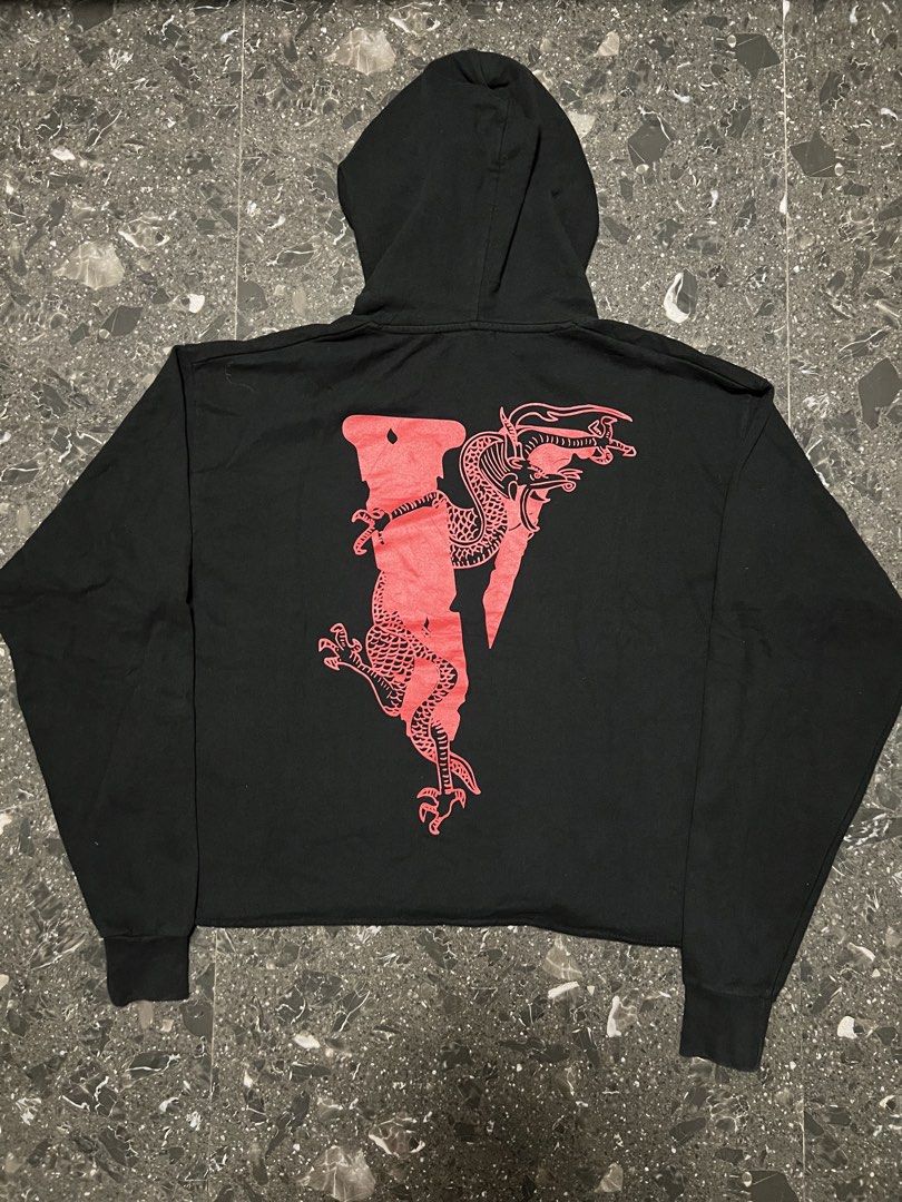 VLONE Black Hoodie (Category: Coats, Jackets and Outerwear) located in Manila. Submitted by justin_sy (Listing ID 1463830083, Image 2). Description: - Black VLONE hoodie - Features red and white graphic print on the front - Long sleeves with ribbed cuffs - Adjustable drawstring hood - Cropped fit design - Ideal for casual wear.