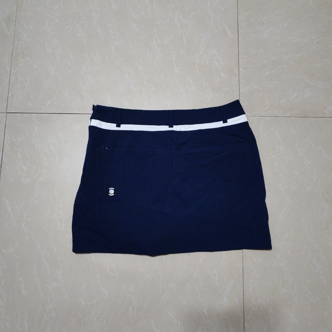 W. ANGLE Golf Skirt Navy Blue White Trim (Category: Skirts) located in Manila. Submitted by ryandip88861707 (Listing ID 1463758725, Image 2). Description: - Navy blue golf skirt - White trim detail at the waistband - Versatile for sports or casual wear - Made with comfortable material.