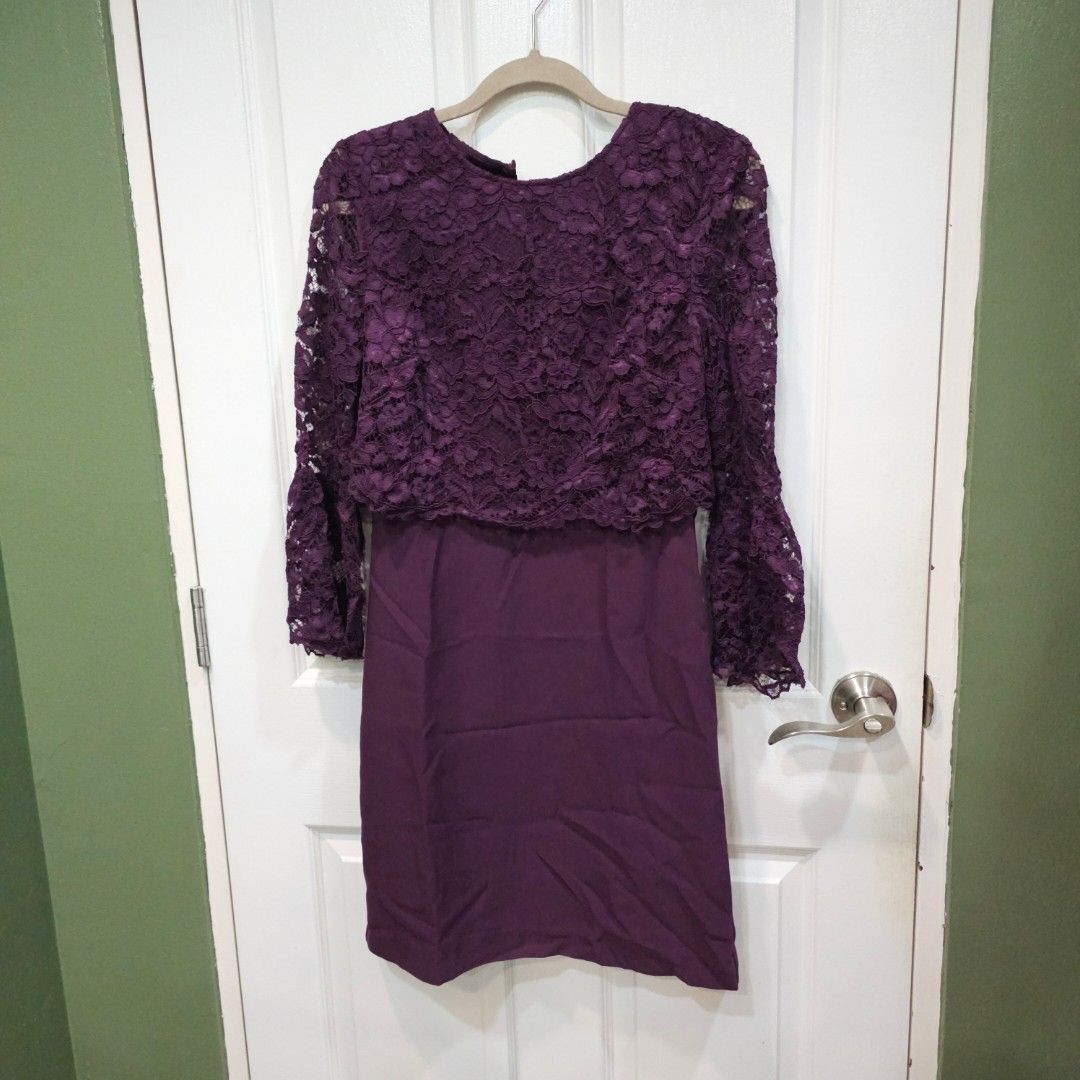 Warehouse Purple Lace Dress (Category: Dresses) located in Makati City. Submitted by goldenbird.001 (Listing ID 1463869950, Image 1). Description: - Warehouse purple dress - Size 10 - Elegant lace overlay on the top - Long sleeves - Solid fabric skirt - Button closure at the back - Ideal for special events.