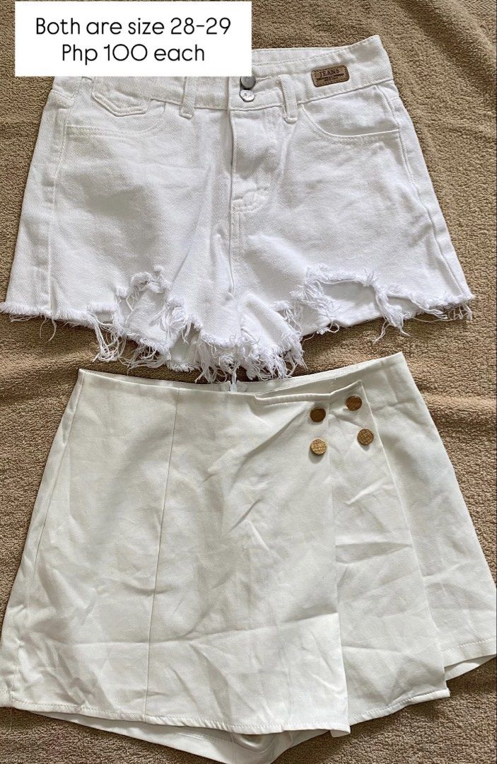 White Denim Shorts & White Skort - Size 28-29 (Category: Shorts) located in Imus. Submitted by theninetiesboxph (Listing ID 1463774910, Image 1). Description: - Two white bottoms available, size 28-29. - Option 1: Distressed denim shorts. - Option 2: White skort with elegant gold button details. - Ideal for casual outings or a fun beach day. - Price: Php 100 each..