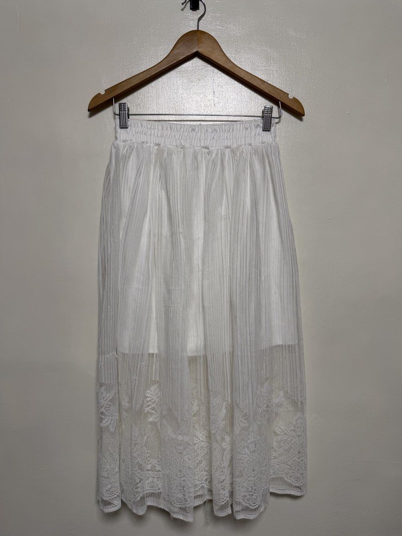 White Lace Trimmed Midi Skirt (Category: Skirts) located in Manila. Submitted by don_p (Listing ID 1463868112, Image 1). Description: M to L - White midi skirt - Sheer lace hem detail - Comfortable elastic waistband - Textured fabric on the upper portion - Perfect for both casual and dressy outfits - Easy to style with various tops.