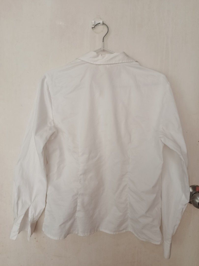 White Long Sleeve Button Up Shirt (Category: Longsleeves) located in Manila. Submitted by tyrrachuuu (Listing ID 1463771268, Image 2). Description: - Classic white long sleeve shirt - Button-up front - Standard fit - Minor marks on fabric (visible in last photo) - Suitable for work or casual occasions - Used twice, says Medium on size tag but fits better for someone Small - Bought from orange app.
