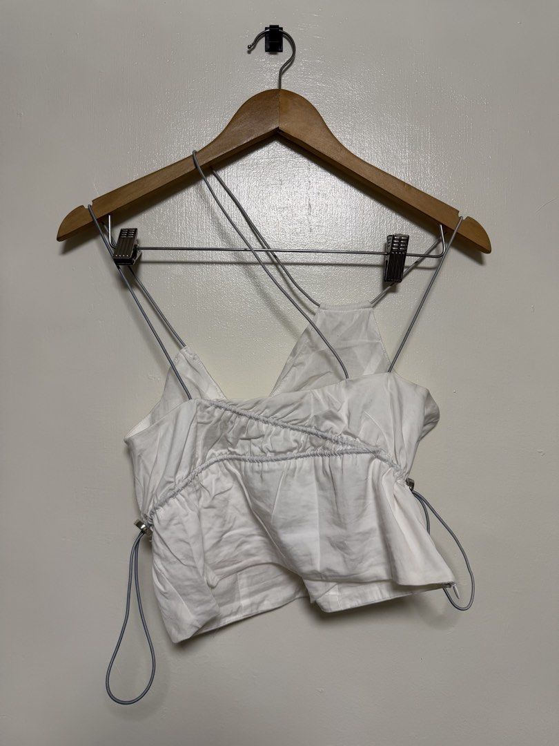White Ruched Drawstring Crop Top (Category: Sleeveless) located in Manila. Submitted by don_p (Listing ID 1463867468, Image 1). Description: XS to S - White crop top - Ruched detailing - Adjustable drawstring sides - Spaghetti straps - Estimated size: Small to Medium - Ideal for summer wear or layering.