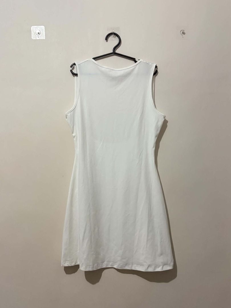 White Sleeveless Mini Dress (Category: Dresses) located in San Leonardo. Submitted by burgossanleonardo.12345 (Listing ID 1463911749, Image 2). Description: - Simple white sleeveless mini dress - Soft and stretchy fabric - Perfect for layering or wearing alone - Easy to dress up or down - Essential wardrobe basic.