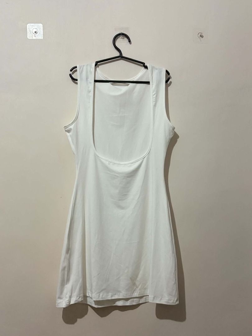 White Sleeveless Mini Dress (Category: Dresses) located in San Leonardo. Submitted by burgossanleonardo.12345 (Listing ID 1463911749, Image 1). Description: - Simple white sleeveless mini dress - Soft and stretchy fabric - Perfect for layering or wearing alone - Easy to dress up or down - Essential wardrobe basic.