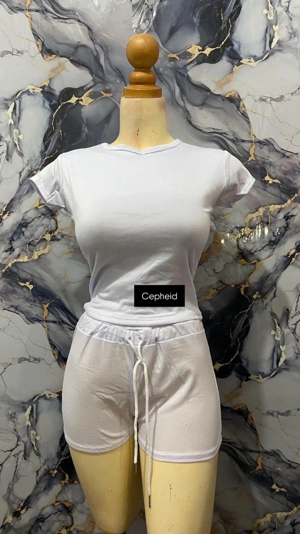 White T-shirt and Shorts Set (Category: Sets or Coordinates) located in Agdangan. Submitted by cepheid_regaspi (Listing ID 1463861546, Image 1). Description: - Casual white t-shirt and shorts set - Comfortable for lounging or running errands - Shorts feature an adjustable drawstring waist - Simple and versatile design - Ideal for everyday wear.