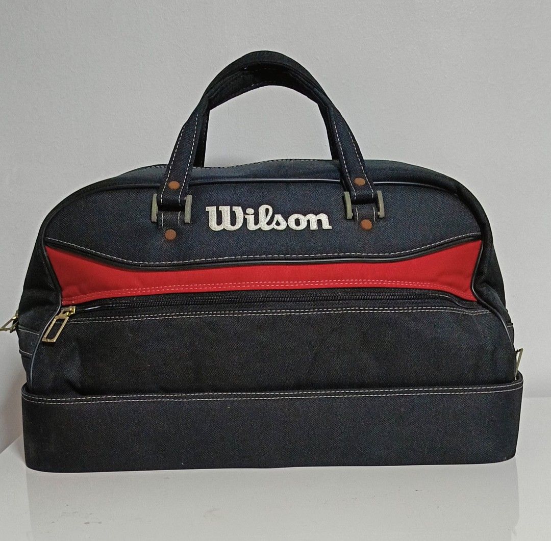 Wilson Duffel Bag Tennis (Category: Backpacks) located in Paranaque City. Submitted by yesyesyo (Listing ID 1463816488, Image 1). Description: - Classic Wilson duffel bag - Color: Black with red accent stripe - Features sturdy handles and a zippered compartment - Ideal for gym sessions or travel - Spacious interior - used with care - lots of compartment this is not thrifted. all are for personal decluttering only. payment thru Gcash delivery opti