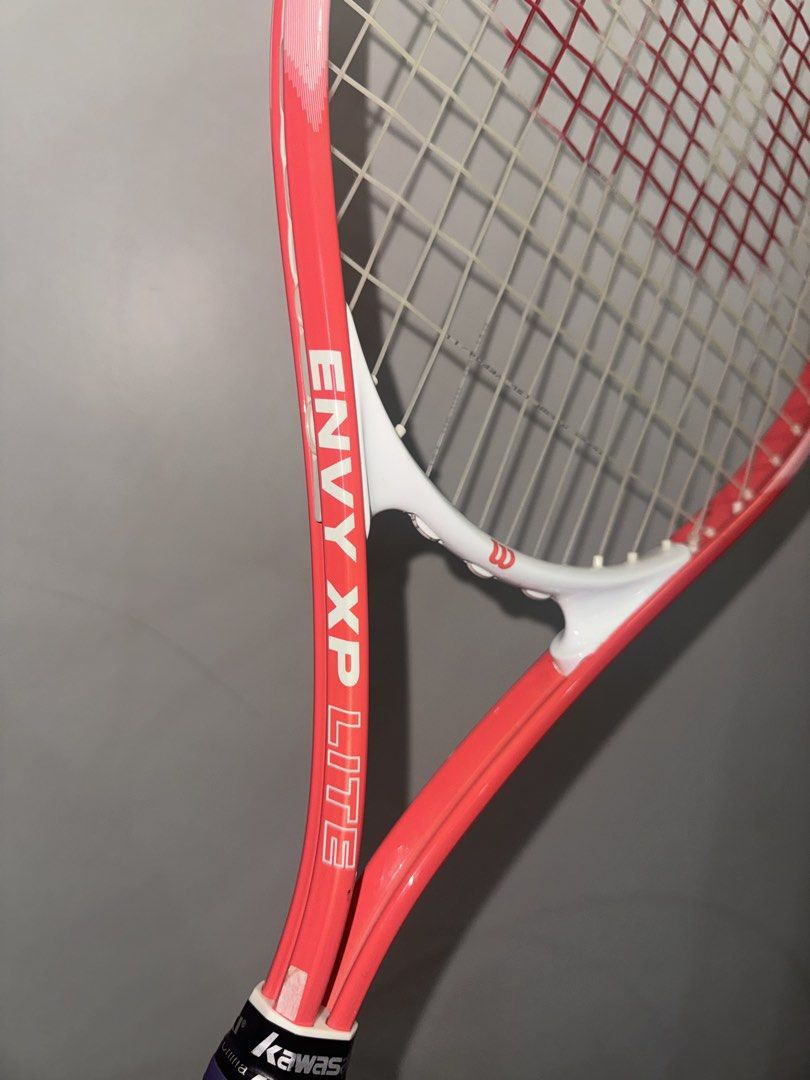 Wilson Envy XP Lite Tennis Racket (Category: Racket and Ball Sports) located in Manila. Submitted by lovedbyfmd (Listing ID 1463923842, Image 1). Description: WILSON ENXY XP LITE 2 - USED P1500 Head 112in Weight 274g Grip 2 .