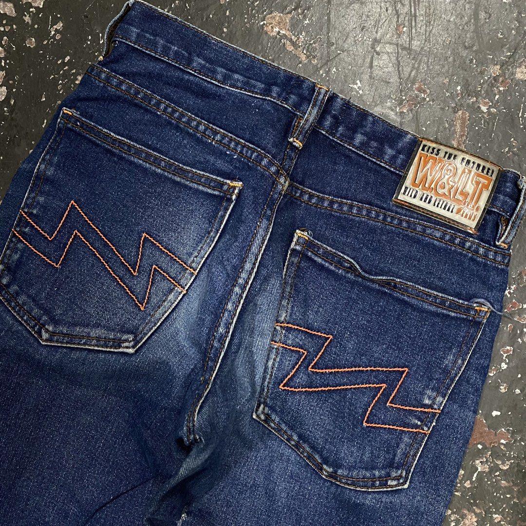 W&LT Wild and Lethal Jeans - Blue Denim (Category: Jeans) located in Cagayan de Oro. Submitted by sumamestreethub (Listing ID 1463875008, Image 3). Description: - Brand: W&LT (Wild and Lethal Jeans) - Color: Blue Denim - Fit: Classic with a slight flare at the bottom - Details: Orange stitching on back pockets, lightning bolt detail on coin pocket - Origin: Made in Italy - Material: 100% Cotton.
