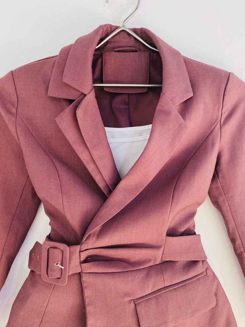 Women's Belted Double-Breasted Blazer (Category: Coats, Jackets and Outerwear) located in Vigan. Submitted by yourcloset1001 (Listing ID 1463911968, Image 2). Description: - Chic mauve blazer - Flattering belted waist - Double-breasted design - Notched lapel - Subtle textured fabric - Perfect for work or a night out - Pairs well with shorts or trousers.