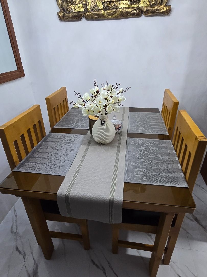 Wooden Dining Table (Category: Tables & Sets) located in Caloocan City. Submitted by calmwhale_c6fe61 (Listing ID 1463892929, Image 2). Description: For Sale Wooden Dining Table 4 seater With Top Glass Chairs with Uratex Foam Good as new. 6 months pa lang sya samin. RFS: Hindi nagagamit dahil laging walang tao sa bahay. .