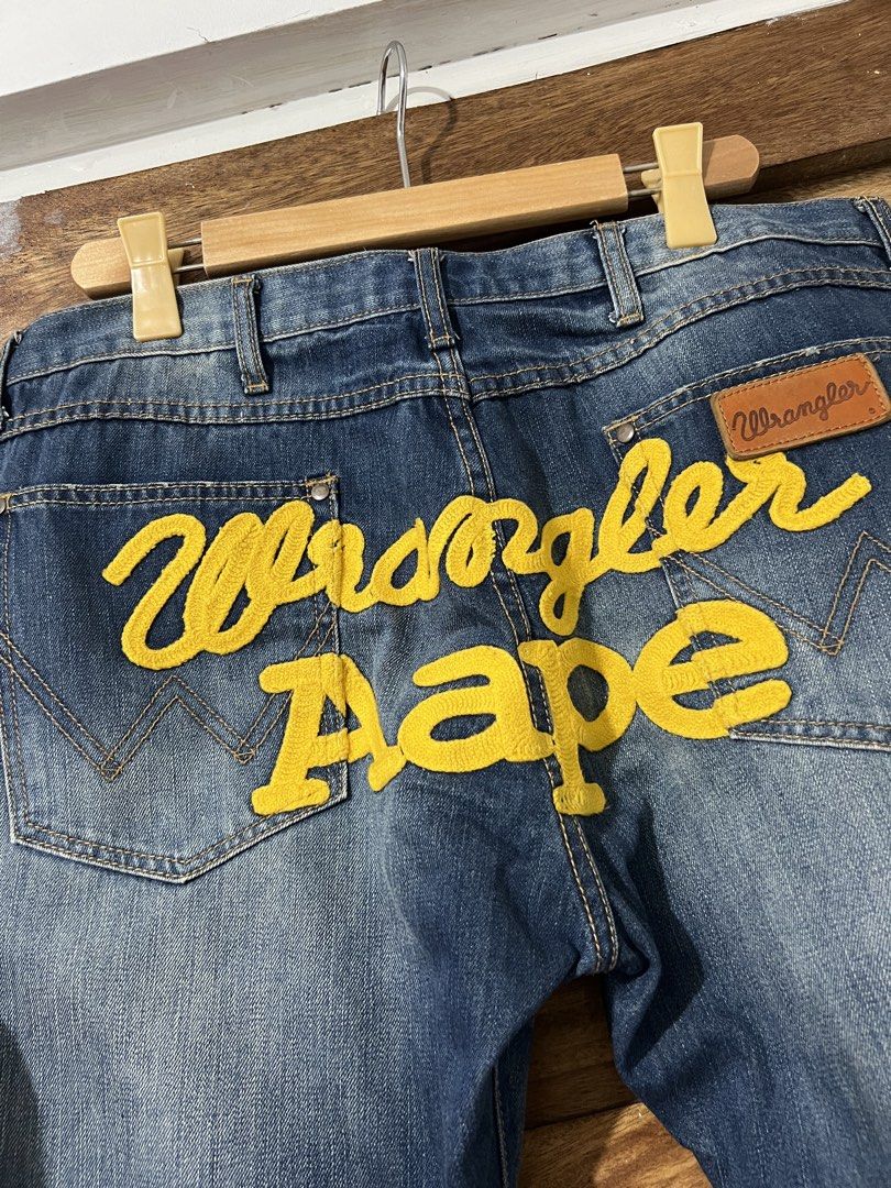 Wrangler x Aape (Category: Jeans) located in Jaen. Submitted by 17thstreetclo.bymkdl (Listing ID 1463826498, Image 3). Description: Wrangler x Aape 9/10 color rate Issue minimal yellow stains and parang niliitan sya. Waist-38 Length-37.5 Leg opening-16.