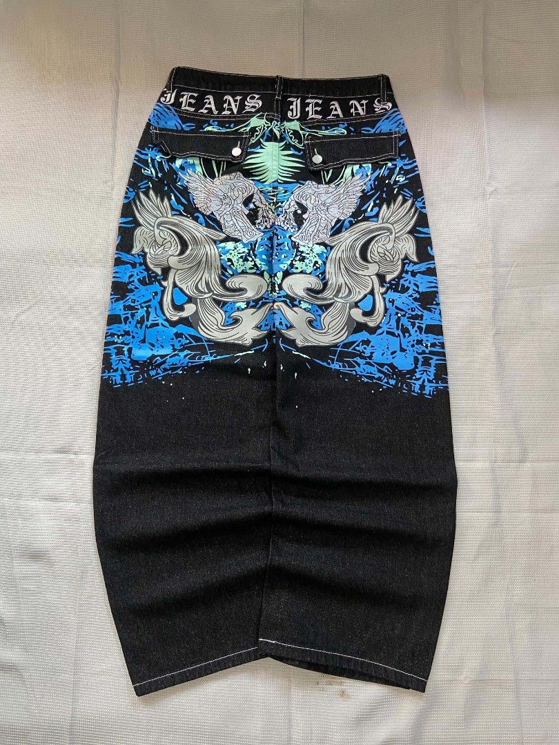 Y2K Graphic Jeans - Blue & Black (Category: Jeans) located in Cebu City. Submitted by jon_roz (Listing ID 1463845526, Image 1). Description: Baggy pants raw denim Hard and semi heavy cotton denim Printed and embroidery design Size 31/32 Length 41 Thigh 13.5 Hem 10 No issues In very good condition 📍 labangon cebu city For pickup or delivery via maxim only Payment first policy if above 150 plus ang delivery fee CAN SHIP NATIONWIDE (payment first p