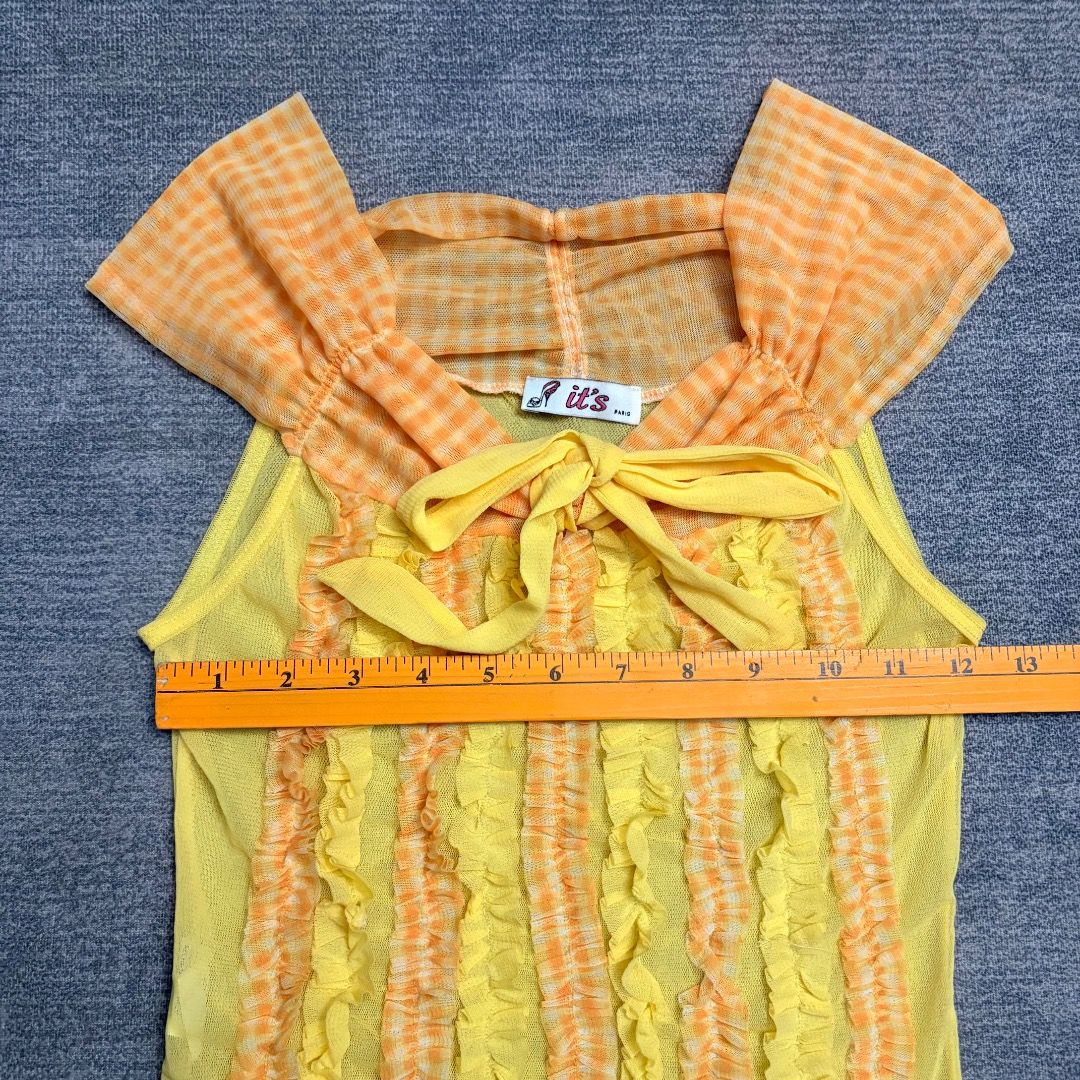Y2K it's paris vertical ruffled (Category: Sleeveless) located in Calamba. Submitted by bermuda.ph (Listing ID 1463879983, Image 3). Description: An orange gingham collar accent, and a front bow tie. .
