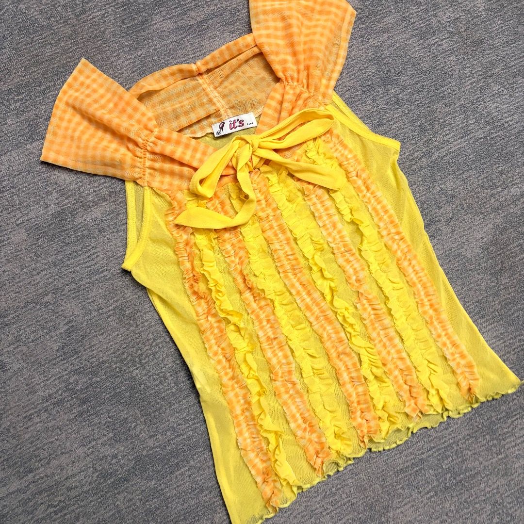 Y2K it's paris vertical ruffled (Category: Sleeveless) located in Calamba. Submitted by bermuda.ph (Listing ID 1463879983, Image 2). Description: An orange gingham collar accent, and a front bow tie. .