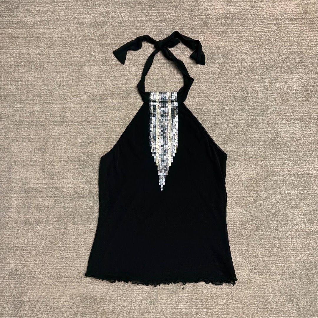 Y2K New Look halter-neck top (Category: Sleeveless) located in Calamba. Submitted by bermuda.ph (Listing ID 1463878207, Image 1). Description: Featuring a vertical, geometric silver sequin and bead embellishments .