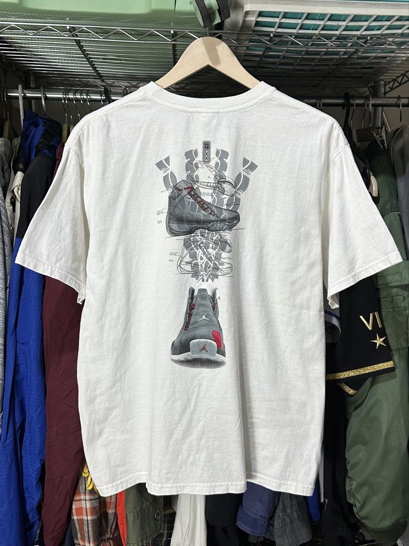 Y2K Nike Jordan 21 Promo Tee (Category: Tshirts & Polo Shirts ) located in Daet. Submitted by thrifthings2018 (Listing ID 1463843625, Image 2). Description: - Authentic Y2K White Nike Jordan 21 Promo Tee - Features unique graphics of the Jordan 21 shoe on both front and back - Front graphic showcases the shoe's sole - Back graphic displays an exploded view of the shoe - Includes the iconic Jordan logo on the lower right front - Size: Medium (M) -