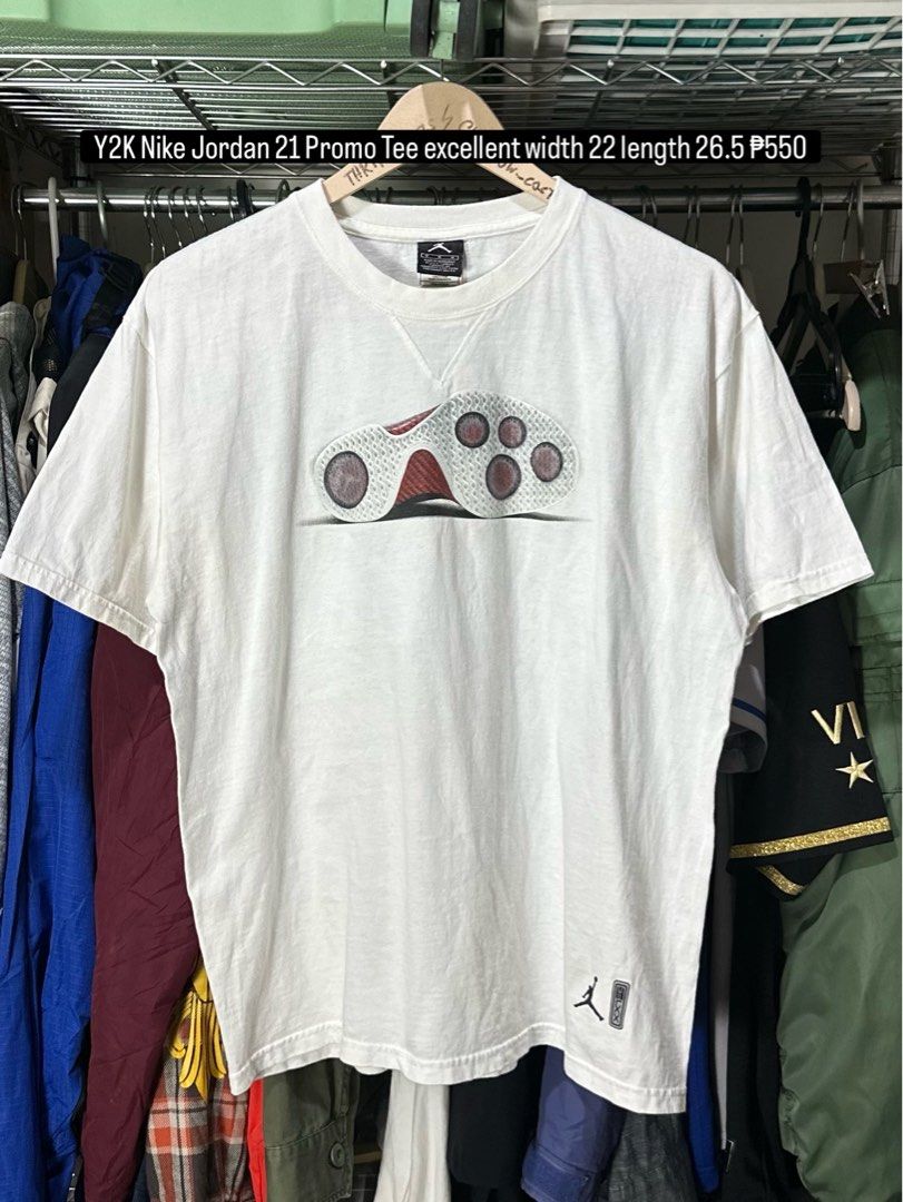 Y2K Nike Jordan 21 Promo Tee (Category: Tshirts & Polo Shirts ) located in Daet. Submitted by thrifthings2018 (Listing ID 1463843625, Image 1). Description: - Authentic Y2K White Nike Jordan 21 Promo Tee - Features unique graphics of the Jordan 21 shoe on both front and back - Front graphic showcases the shoe's sole - Back graphic displays an exploded view of the shoe - Includes the iconic Jordan logo on the lower right front - Size: Medium (M) -