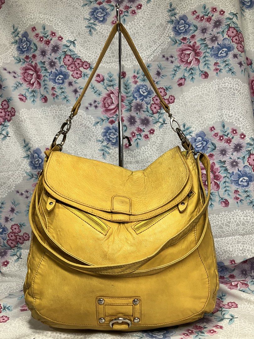 YELLOW PEBBLED LEATHER HOBO SHOULDER BAG (Category: Cross-body Bags) located in General Mariano Alvarez. Submitted by adonid (Listing ID 1463763712, Image 1). Description: YELLOW PEBBLED LEATHER HOBO SHOULDER BAG GOOD CONDITION NORMAL SIGN OF USAGE ONLY.