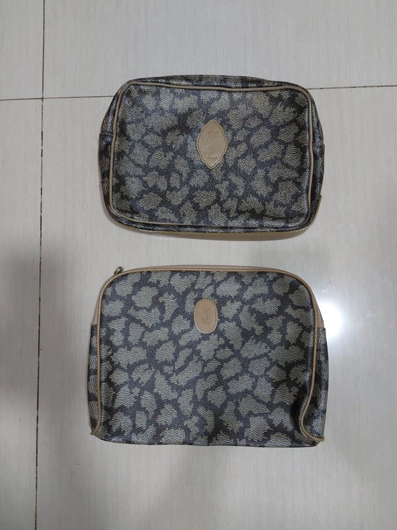 YSL clutch/pouch bundle 2 pcs (Category: Clutches) located in Quezon City. Submitted by threetwotwo2ndaccount (Listing ID 1463791291, Image 1). Description: YSL pouch/clutch bundle 2pcs good condition ykk zipper issue: ung isa putol lng zipper puller pero working no inclusion bawal sa maselan bawal sa barat.