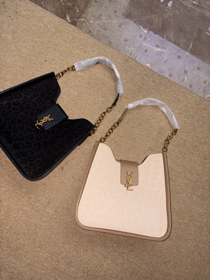 YSL Shoulder Bag (Category: Shoulder Bags) located in Minglanilla. Submitted by loramarie (Listing ID 1463801322, Image 3). Description: 🤍 Brand: Yves Saint Laurent (YSL) 👜 Style: Shoulder Bag 🎀 Color: Black & Beige ✨ Design: Classic quilted finish with YSL logo detail 🔗 Strap: Chain shoulder strap 🔒 Closure: Flap-style closure 🖤 Hardware: Gold-tone hardware 📏 Size: Medium / compact size 🎒 Interior: Spacious enough for daily essentials — 