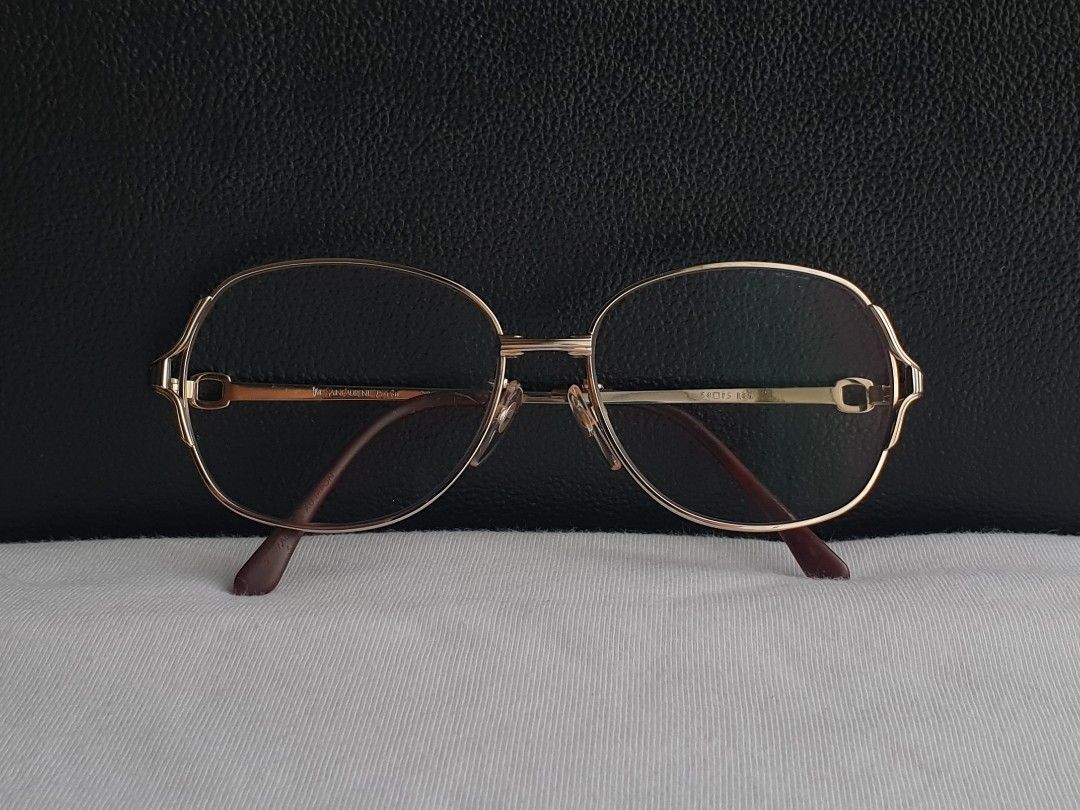 YSL Yves Saint Laurent Eyeglass Frame (Category: Sunglasses & Eyewear) located in Quezon City. Submitted by WasalakTwo (Listing ID 1463928799, Image 2). Description: Bought in Japan Authentic Durable and high quality Goodcondition Clean and presentable Lens are graded, but replaceable Open for delivery nationwide Front Width 13.4cm Front Height 4.6cm.