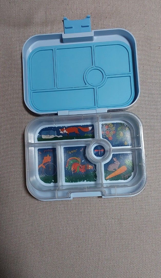 Yumbox Lunch Box - Blue with Animal Theme (Category: Other Babies Going Out Needs) located in Quezon City. Submitted by lisolette (Listing ID 1463853319, Image 1). Description: - well used but still has a lot of life left - no cracks - peeling and fading on printed graphics on transparent tray (normal wear and tear) - perfect for those who want to try bento first, includes 3 free sandwich cutters bpi or gcash, lalamove or j&t .