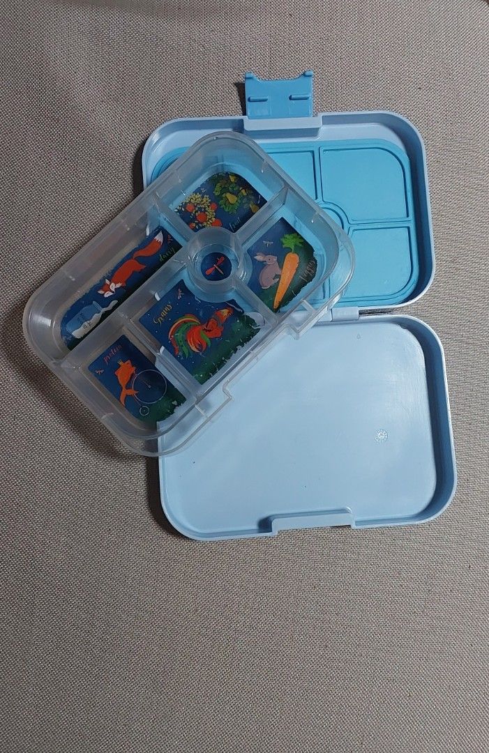 Yumbox Lunch Box - Blue with Animal Theme (Category: Other Babies Going Out Needs) located in Quezon City. Submitted by lisolette (Listing ID 1463853319, Image 3). Description: - well used but still has a lot of life left - no cracks - peeling and fading on printed graphics on transparent tray (normal wear and tear) - perfect for those who want to try bento first, includes 3 free sandwich cutters bpi or gcash, lalamove or j&t .