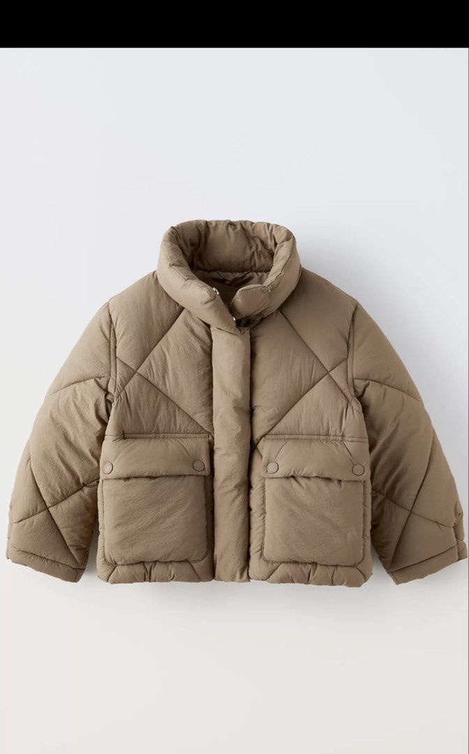 ZARA Brown Puffer Jacket (Category: Babies & Kids Fashion) located in San Fernando. Submitted by lovepreloved13 (Listing ID 1463793085, Image 1). Description: - Zara Brown puffer jacket with discoloration - Bought directly from Zara store but has discoloration due to storage 😔 - Diamond quilting - Two front pockets with snap closures - Warm and cozy for cooler weather - Can stand Japan snow - Easy to style.